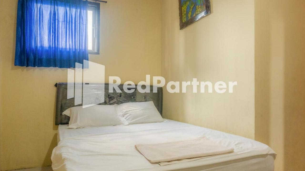 Vandhela Homestay Syariah Mitra Reddoorz Surabaya Exterior photo