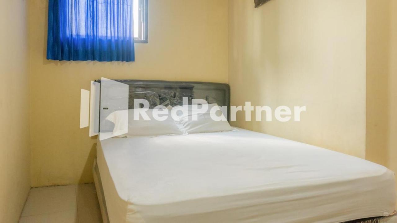 Vandhela Homestay Syariah Mitra Reddoorz Surabaya Exterior photo