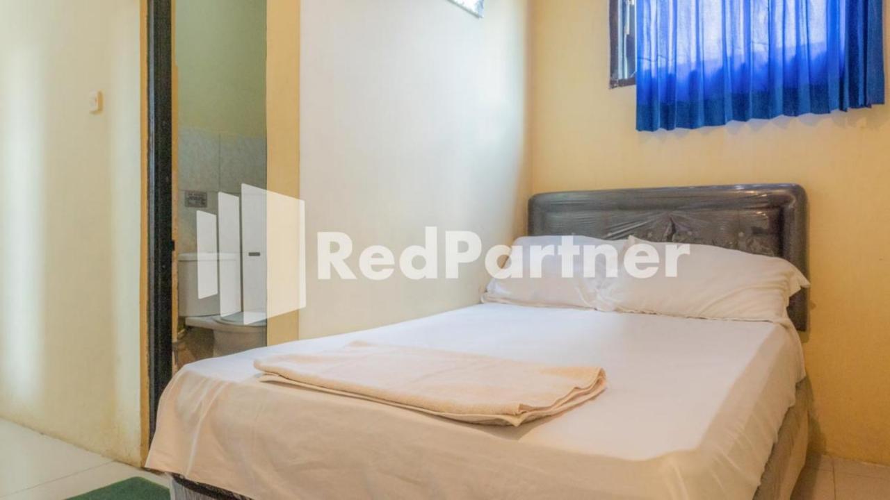 Vandhela Homestay Syariah Mitra Reddoorz Surabaya Exterior photo